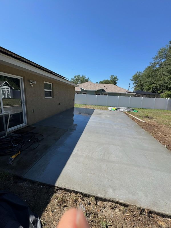 Precision Concrete Patio Installation by Wilkerson Crete LLC: Expanding Outdoor Living Spaces