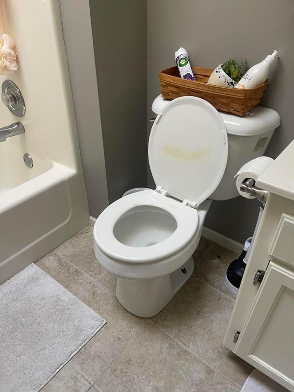 Finished bathroom toilet after a plumbing repair