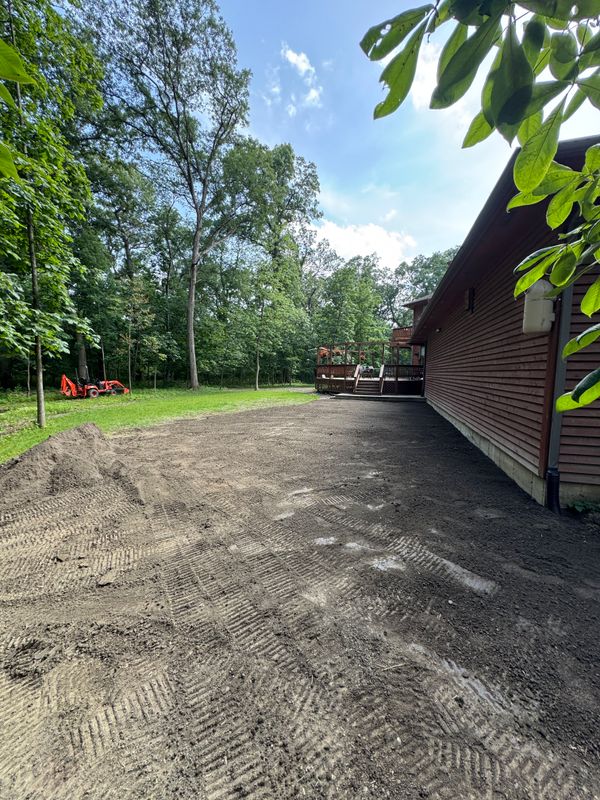 60 Yards of Fill and a Full Backyard Regrade in Lowell