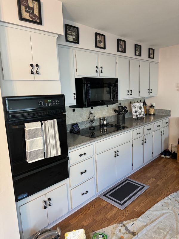 Joliet Kitchen Revitalization: Transformative Cabinet and Ceiling Painting by TL Painting