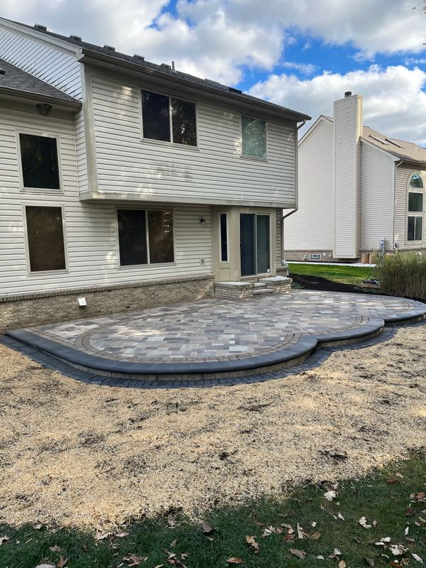 "Transformative Patio Excellence: Sunstone Construction's Mastery in Hardscaping Innovation"