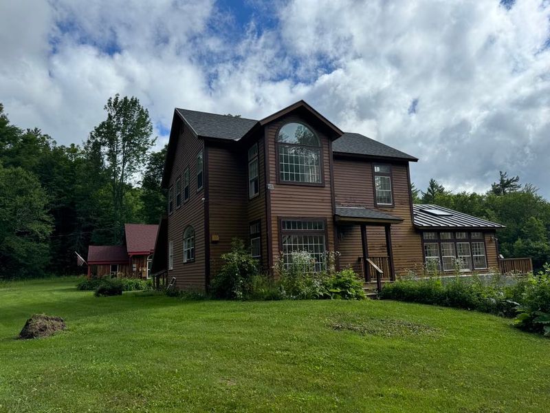 Face lift for this beautiful home. New windows, siding and deck.