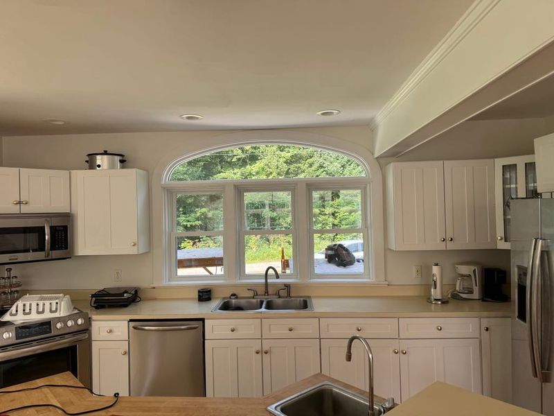 Face lift for this beautiful home. New windows, siding and deck.