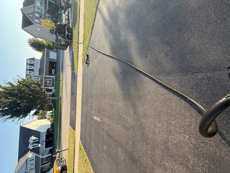 "Transform Your Curb Appeal: Exceptional Driveway Protection by Black Diamond Sealcoating"