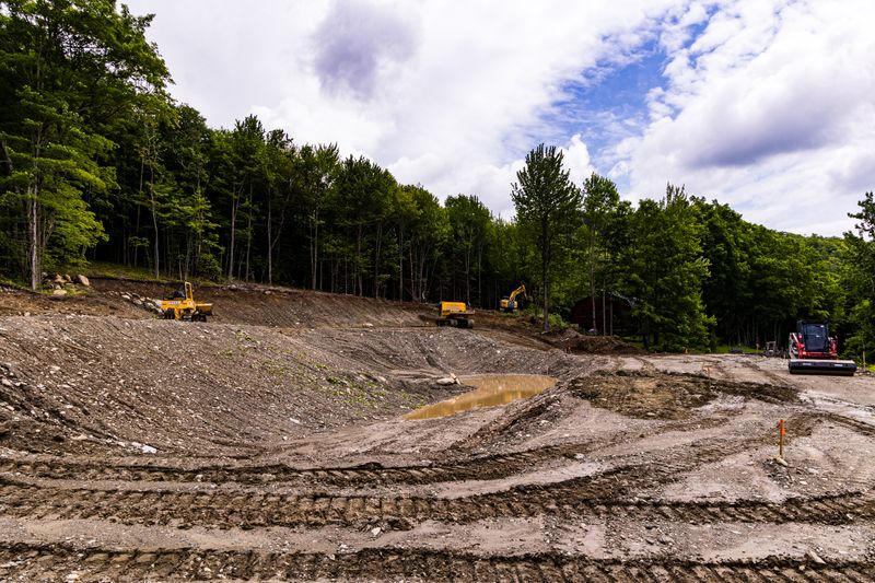 Carving a Pond into a Mountain Side
