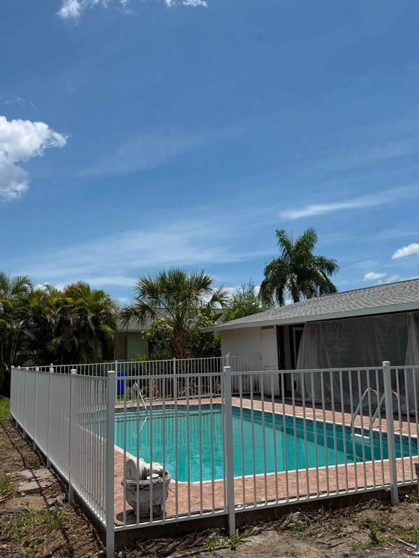 Custom White Aluminum Picket Pool Fencing: Port Charlotte Project