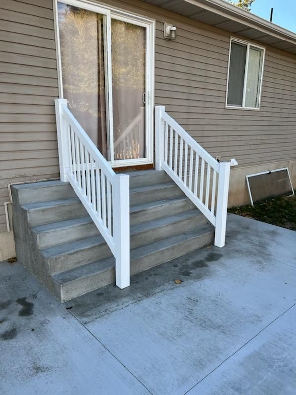 "Elevate Your Outdoor Experience: Mountain Ridge Fence & Decks' Masterful Railing and Concrete Pad Installation in Clinton, UT"