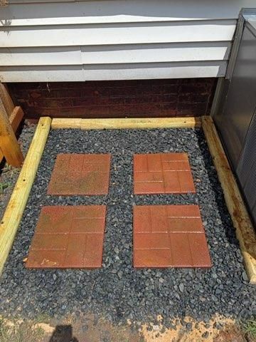 "Transforming Spaces: Efficient Drainage Solution with Stylish Paver Installation by Land Legends Landscapes"