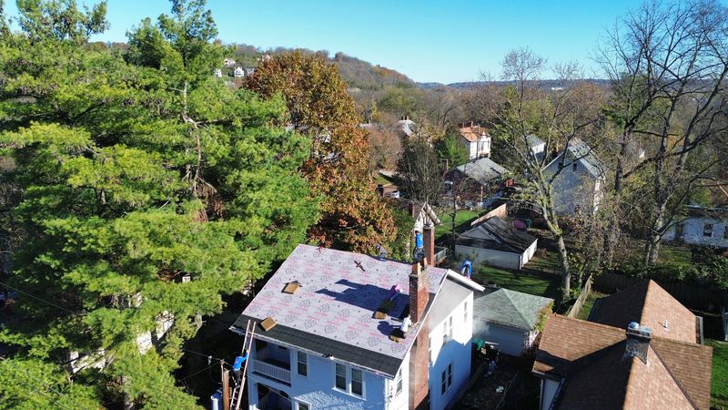 Midnight Plum Pinnacle: Elevating Cincinnati Homes with Lifetime-Guaranteed Roofing Solutions