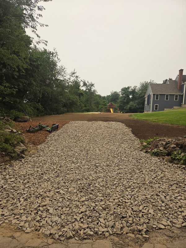 Driveway &. Backyard Extensions