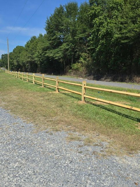 Enhancing Open Spaces: Durable Fence Installation by Coosa Valley Fence and Deck