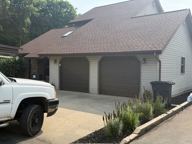 New Garage Doors and Openers Installed on This Two-Car Garage