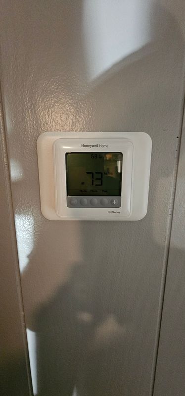 Thermostat Installation and Programming