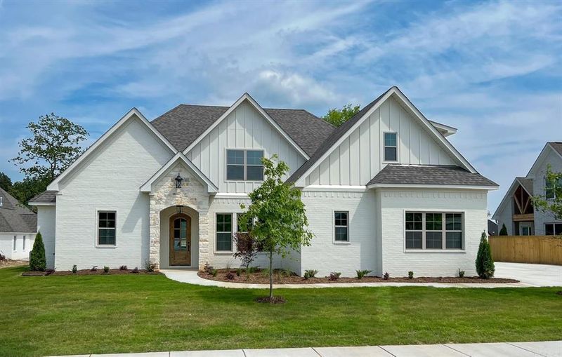 Timeless Elegance: Showcasing the Weathered Limestone Masterpiece at Lake Vista