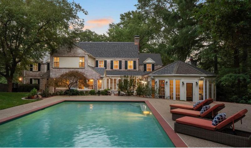Revitalizing Frontenac: Expert Softwashing and Gutter Cleaning for a Pristine Brick Home and Patio