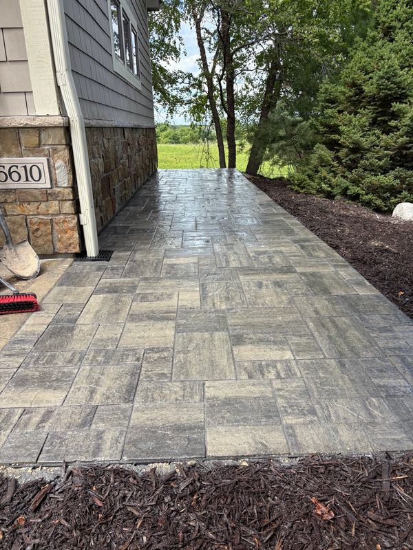 Innovative Paver Patio for Enhanced Garage Cart Storage