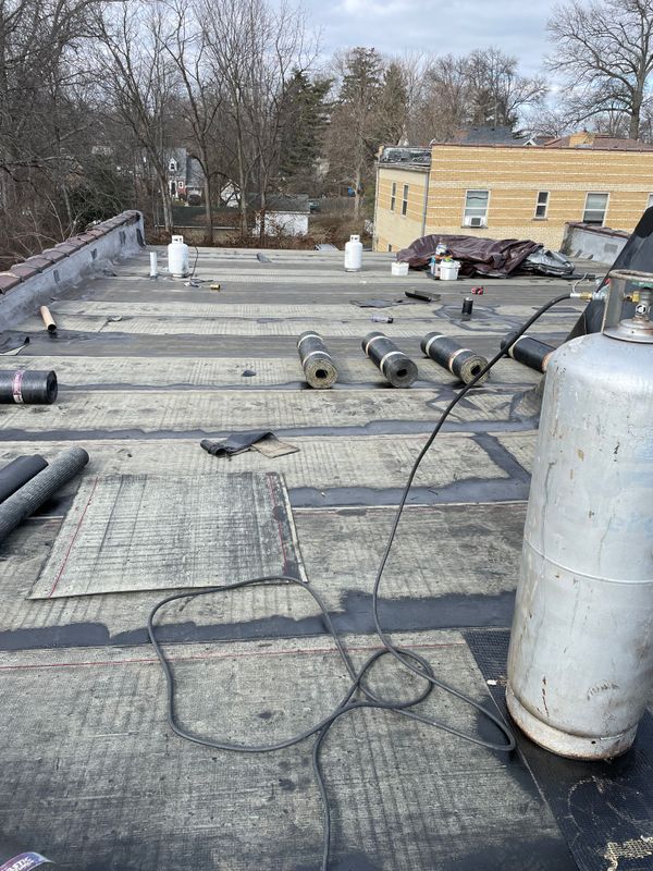 Modified bitumen flat roofing services