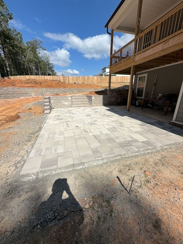 Transforming Terrain: UPscape's Hardscape Masterpiece in Fairview's Backyard