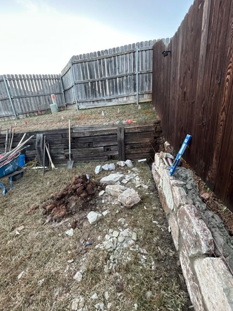 Remove old railroad ties replace with new sandstone