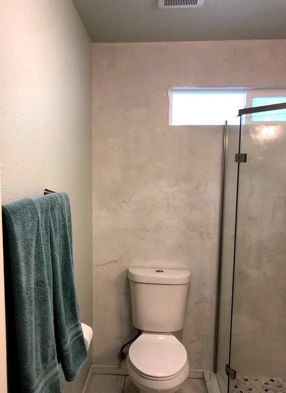 White micro cement shower walls