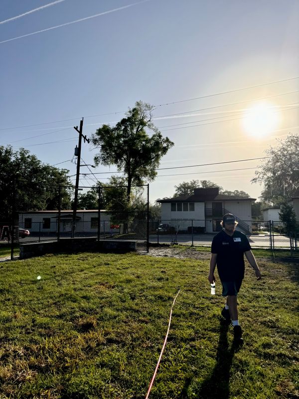 "Green Legacy: Transforming Orange Park Elementary's Kickball Tradition with Pro Designs Landscaping"