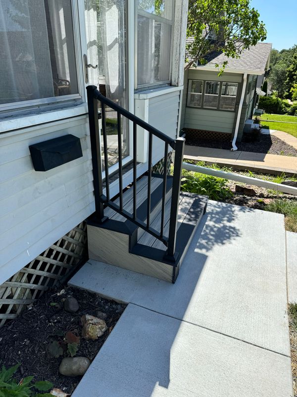 Composite Stair Build with Westbury Aluminum Railing on a Front Entry