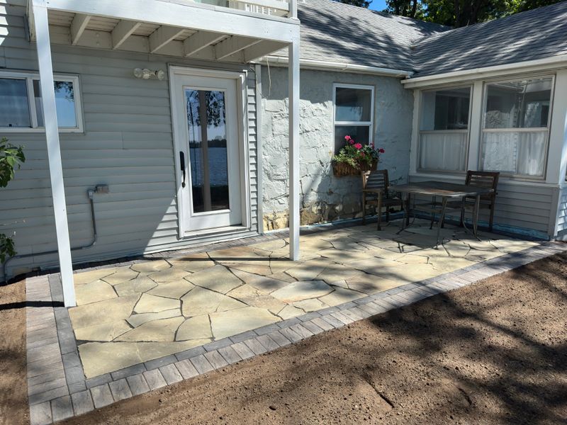 Transforming Outdoor Spaces: Stunning Flagstone Patio Addition