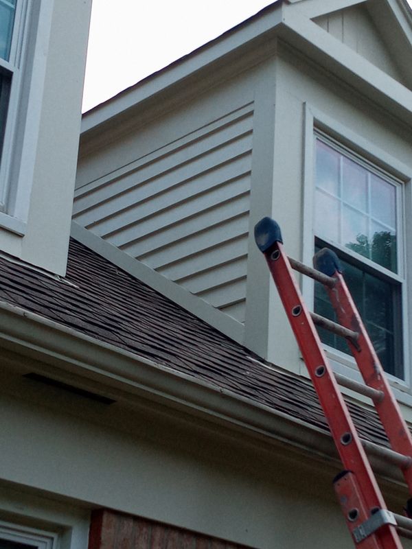 Elevating Home Protection: Masterful Chimney Cricket and Wood Siding Installation in Beckett Ridge