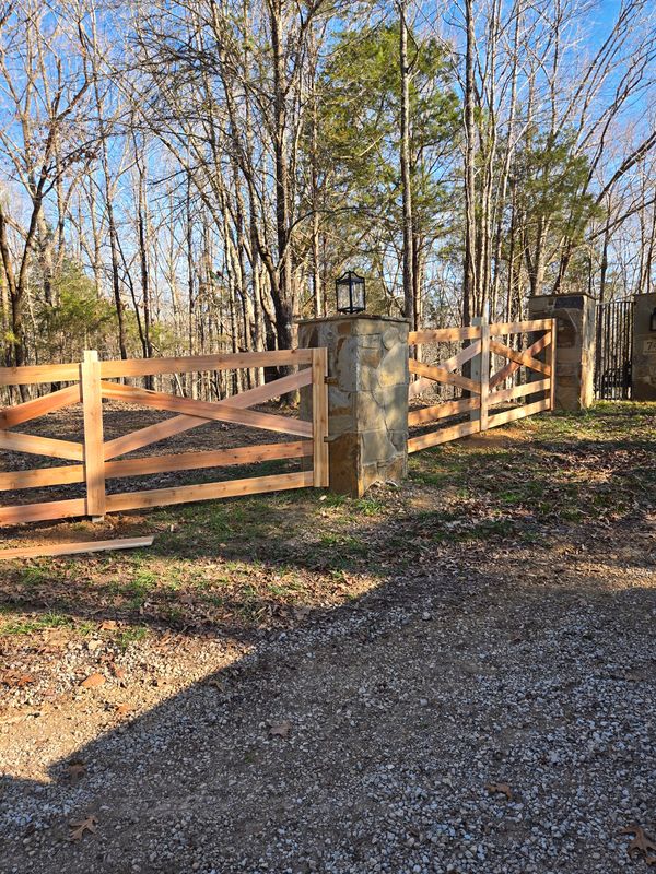 Williston Elegance: Transformative Western Red Cedar Crossbuck Fencing by Patriot Fence