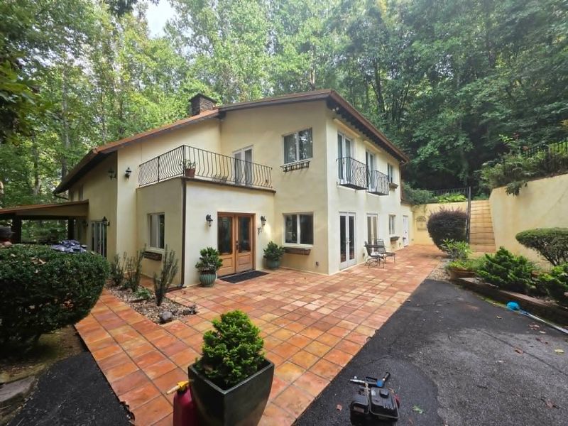 Sparkling Transformation: Precision Pressure Washing Revitalizes Patio Tiles and Stucco Surfaces