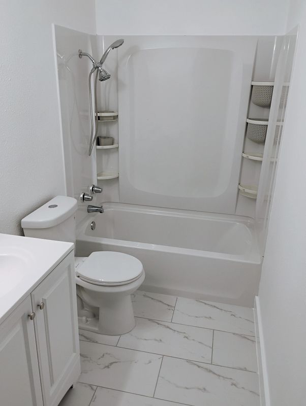 Modern Elegance: Transformative Bathroom and Kitchen Remodel by York Construction and Remodeling