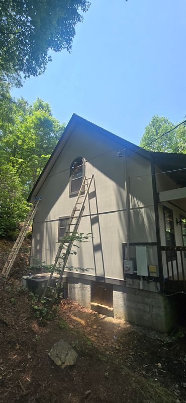 Fort Mountain replaced siding and painted the housw