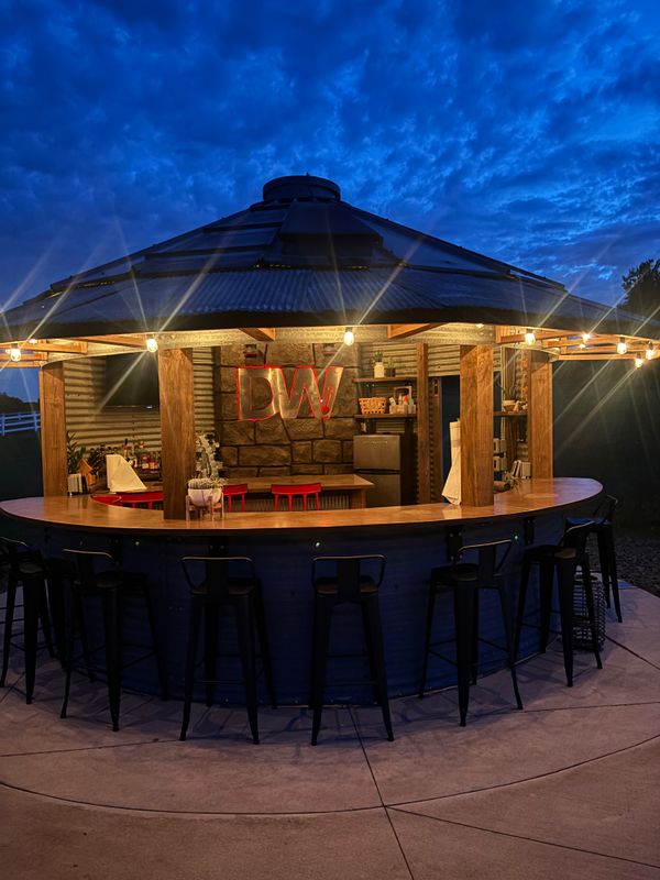 Outdoor kitchen and living spaces.