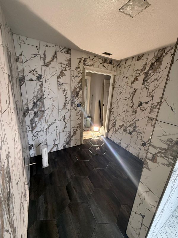 Converting 2 Bathrooms into 1