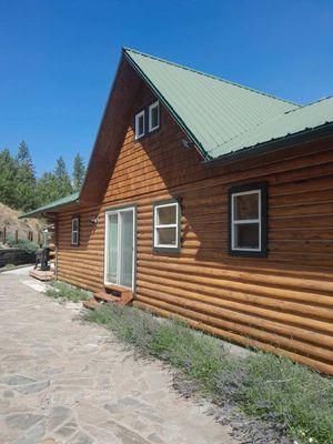 Reviving Rustic Charm: Inchelium Log Home Transformation with Expert Staining and Finishing Techniques