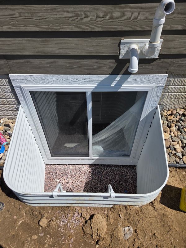 Adding an Egress Window to Create a Code-Compliant Basement Bedroom
