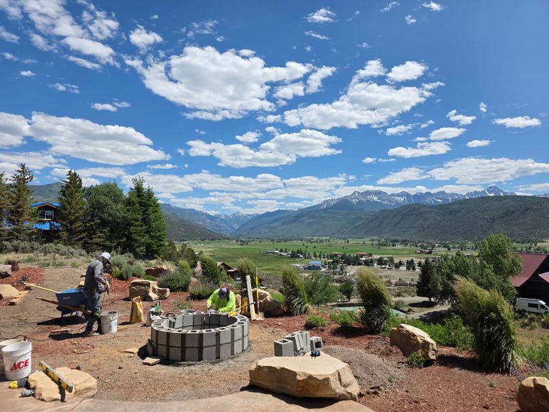 Transforming Ridgway Outdoors: A Bespoke Flagstone Patio with Fire Pit Expertise