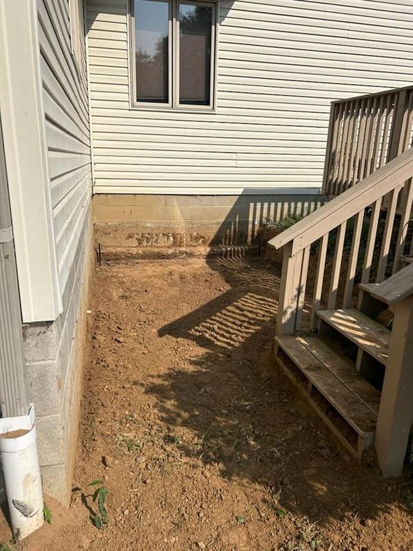 Concrete pad and Grill Hut