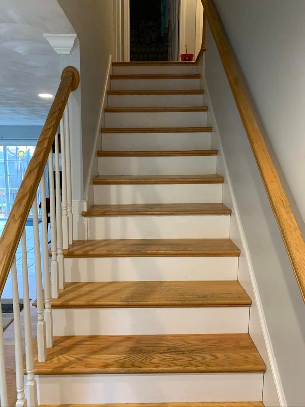 Elegant Staircase Construction in Boston: A Sam's Moving & Storage Co. Handyman Service Masterpiece