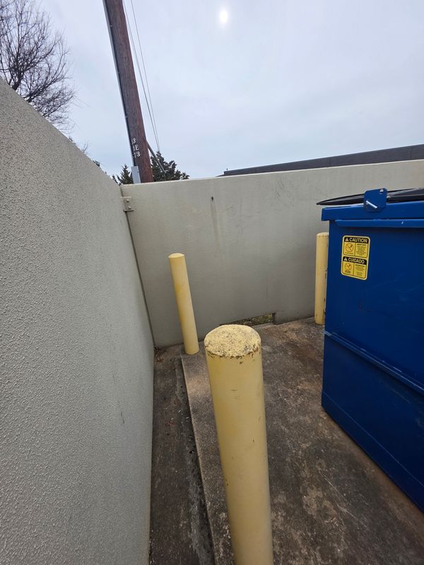 Dumpster Enclosure Clean Up