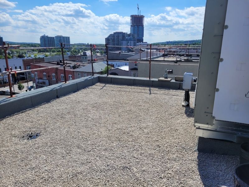 Elevating Durability: Triumph Inc's Expert Flat Roof Restoration in Barrie, ON