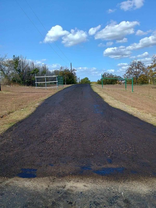 Farmersville Driveway Transformation: Expert Asphalt Milling and Coating by Sand And Gravel Solutions
