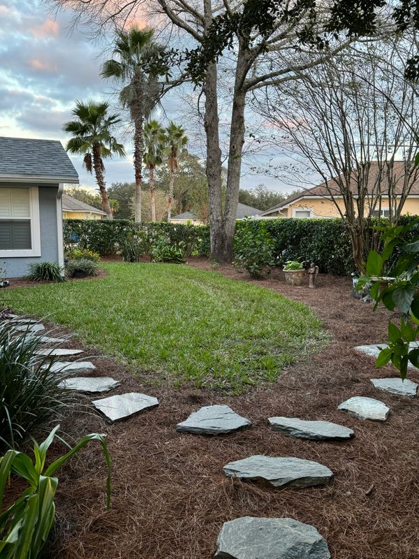 Revitalize Jacksonville: Transformative Paver Patio and Elegant Slate Pathways by Pro Designs Landscaping