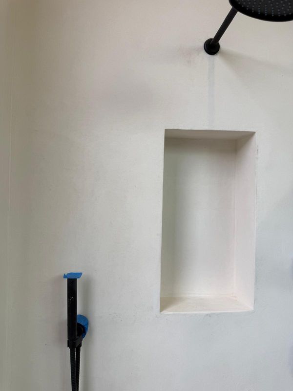 White micro cement shower walls