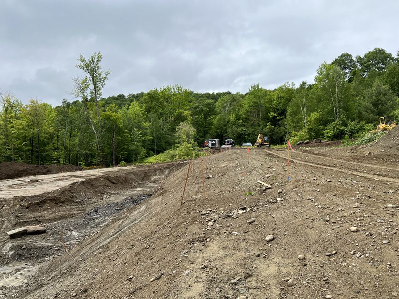 Carving a Pond into a Mountain Side