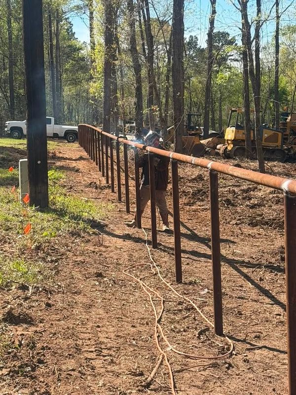 Custom Pipe fencing, entrances and riding arena