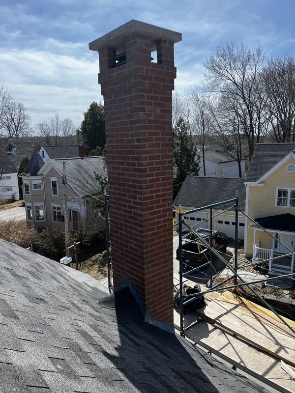 Chimney Masterpiece: Elevating Home Aesthetics in Coastal Maine