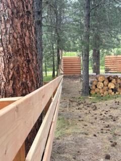 "Forest Haven: Custom Wood Fencing for Enhanced Privacy and Natural Beauty"