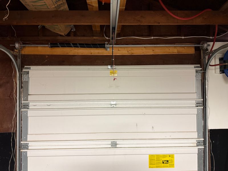 Broken Garage Door Spring Replaced With a Longer-Lasting System