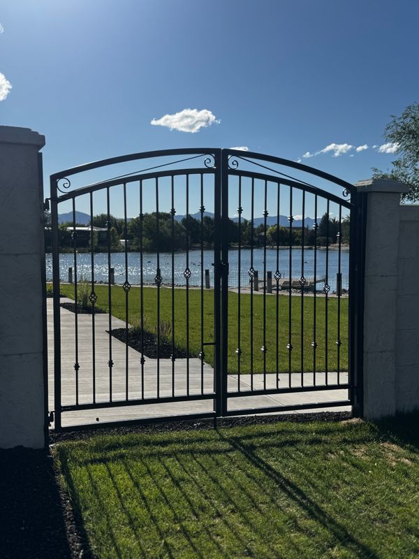 Elegant Entrances: Custom Decorative Gates by Iron Peak Welding